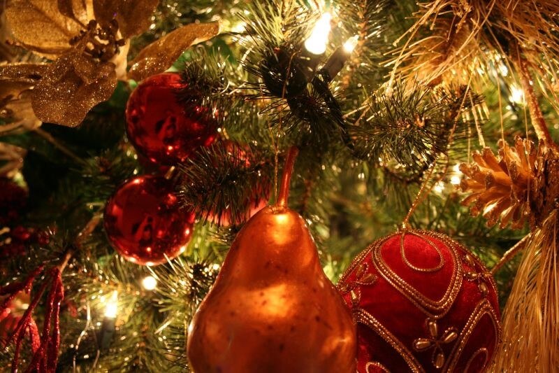 Christmas decors and lights hanging on a Christmas tree