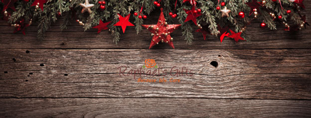 Raphael's Gifts Logo placed in the middle of a Christmas ornaments hanging on a wood