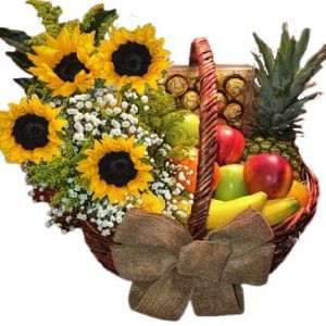 sunflowers, ferrero and fruits in a basket